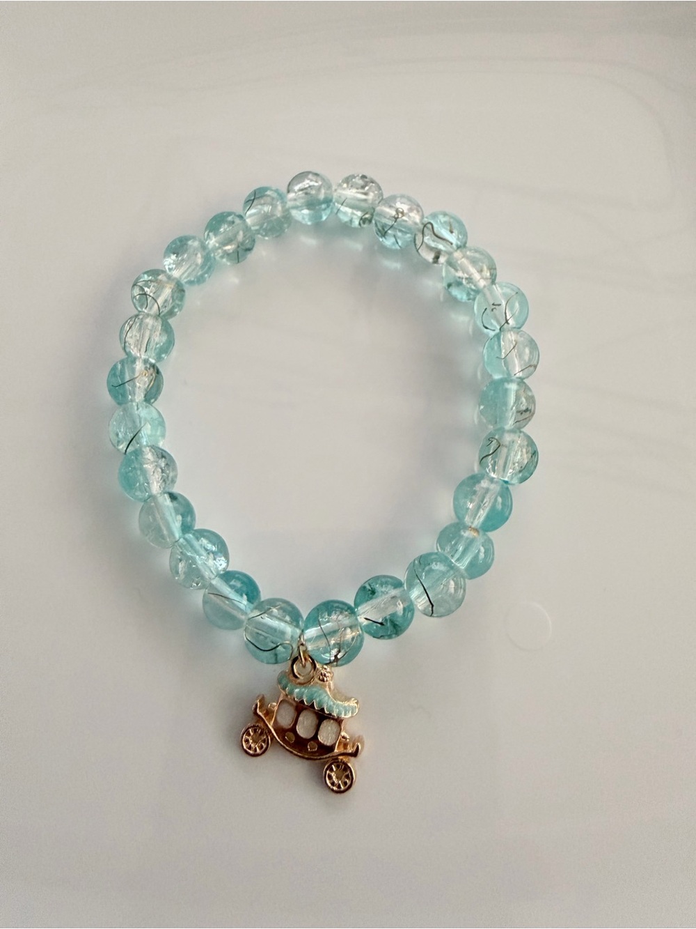 Aqua Crystal Bead Bracelet with Gold Carriage Charm